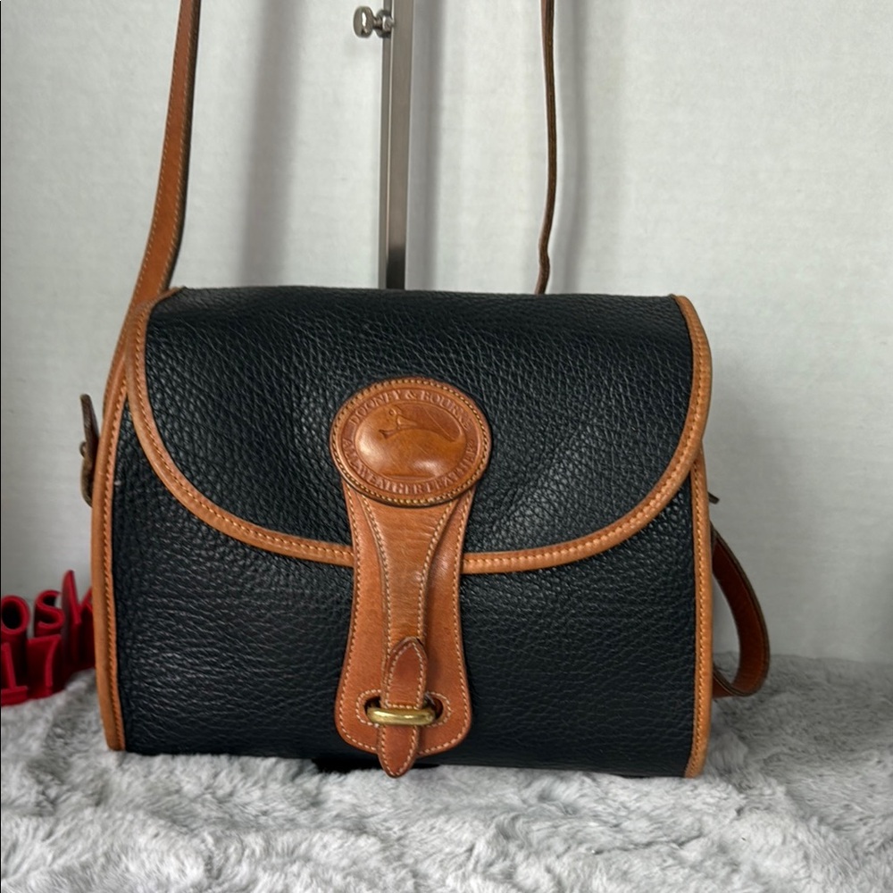 Dooney & Bourke Black and Tan Crossbody Bag with Classic Design
